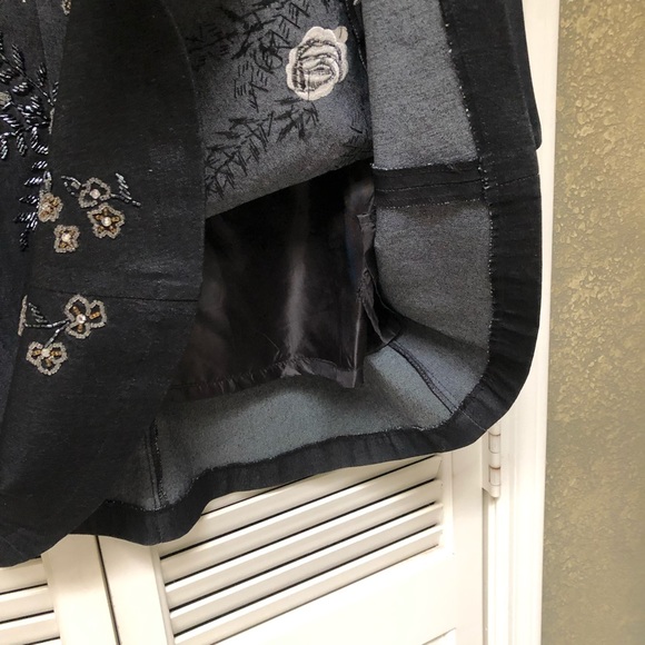 Dark denim stud and embellished skirt.  A-line - Picture 10 of 12